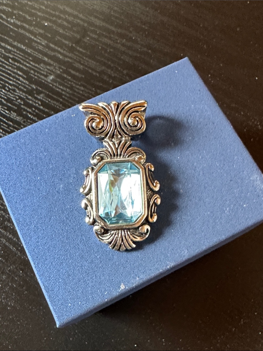Silver-Tone Pendant with Light Blue Gemstone